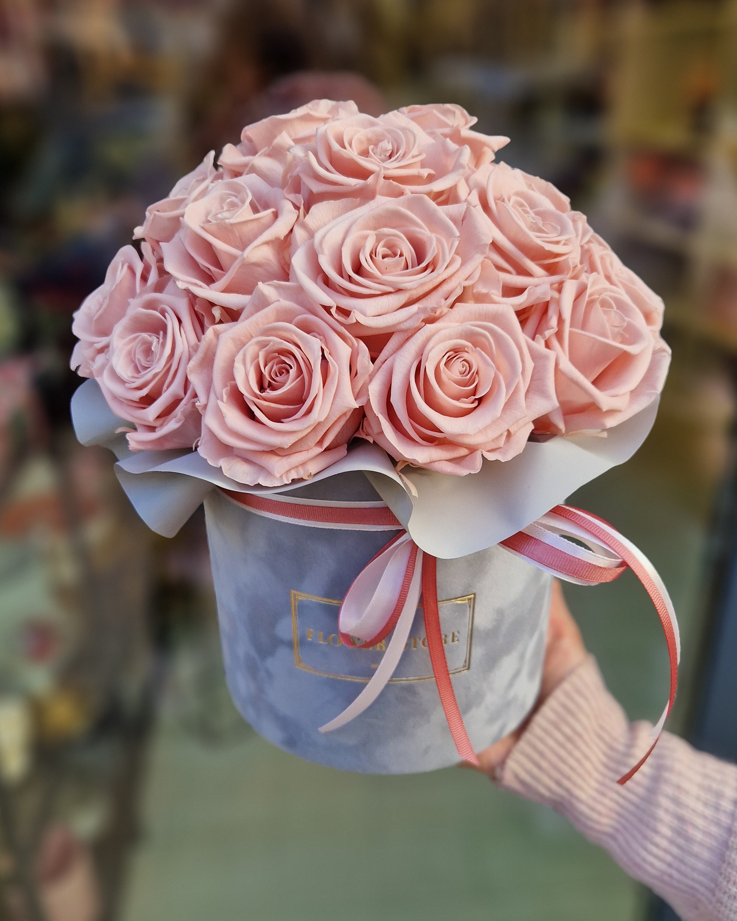Eternal pink pink roses in a gray flocked box