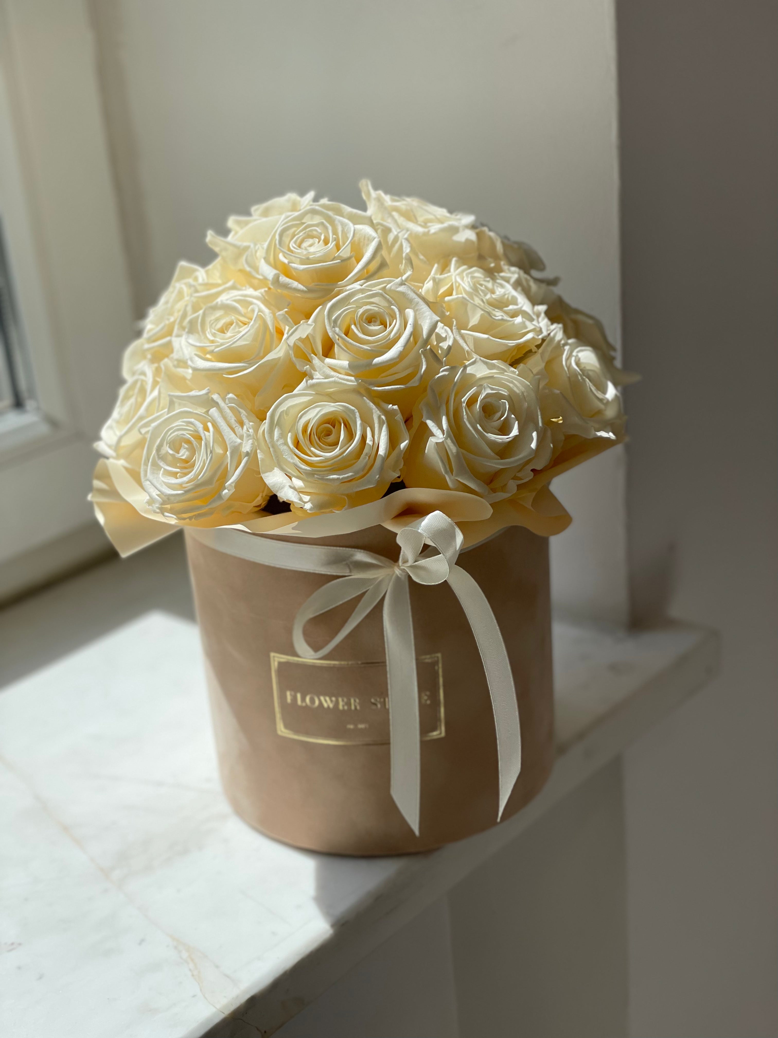 White eternal roses in a Beige and Caramel Box