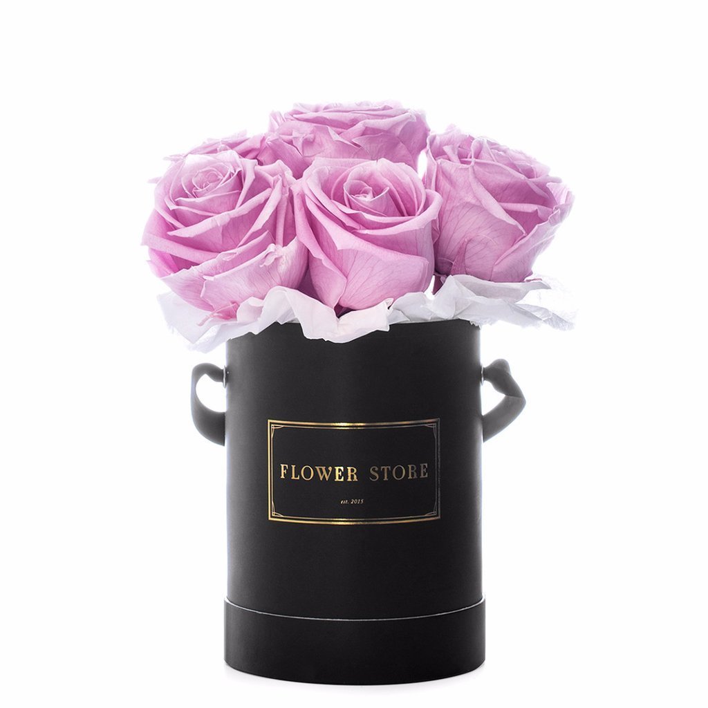 A small black box with pink eternal roses