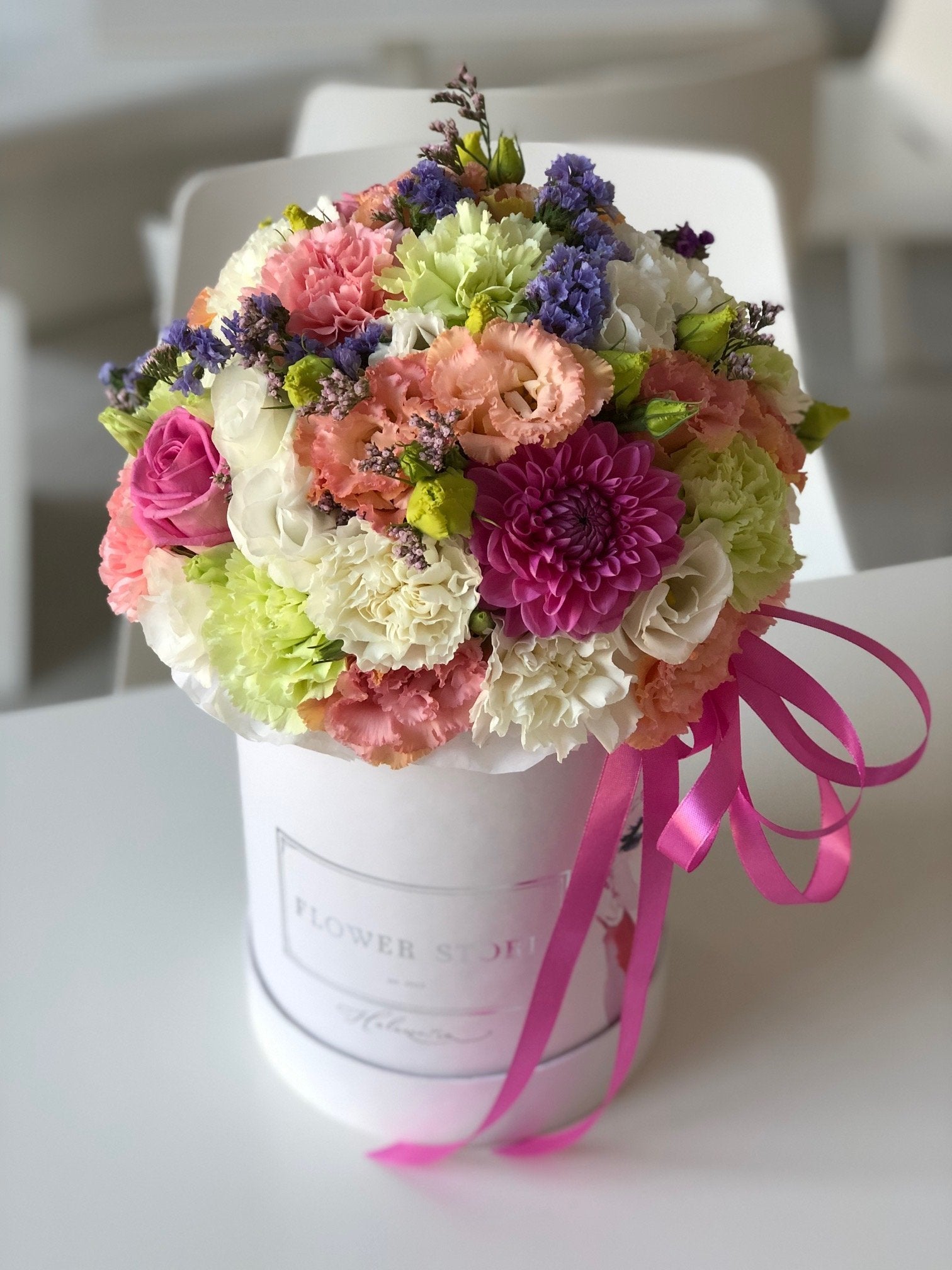 Spring composition in a medium white box - live flowers flowerbox