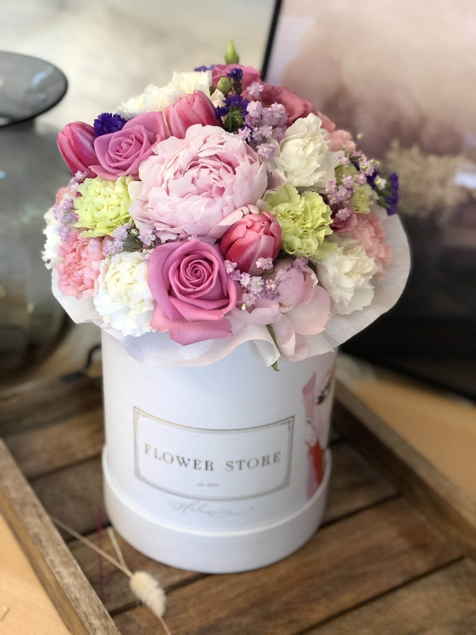 Spring composition in a medium white box - live flowers flowerbox