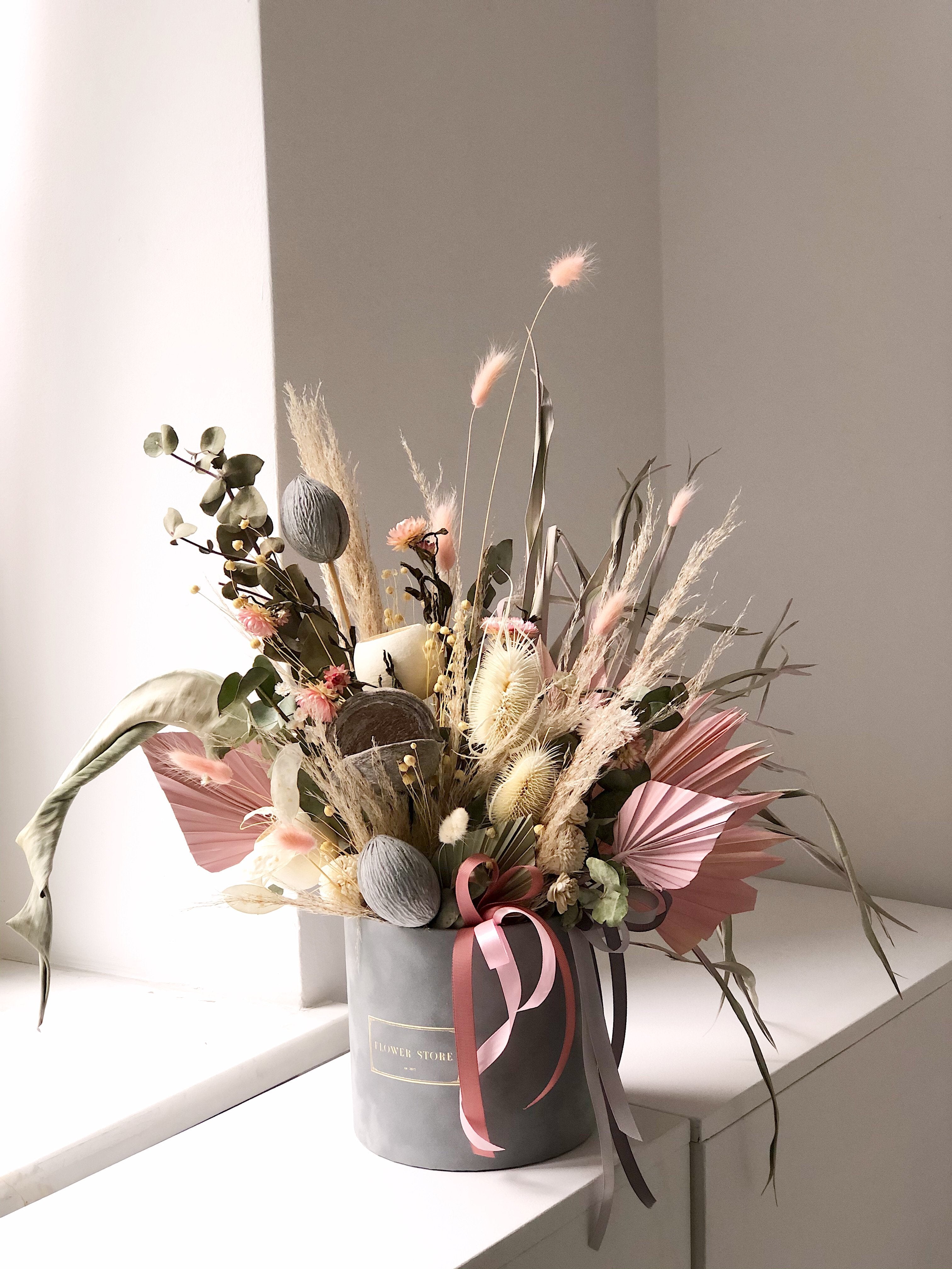 Dried composition with gray flocked Pink flowerbox