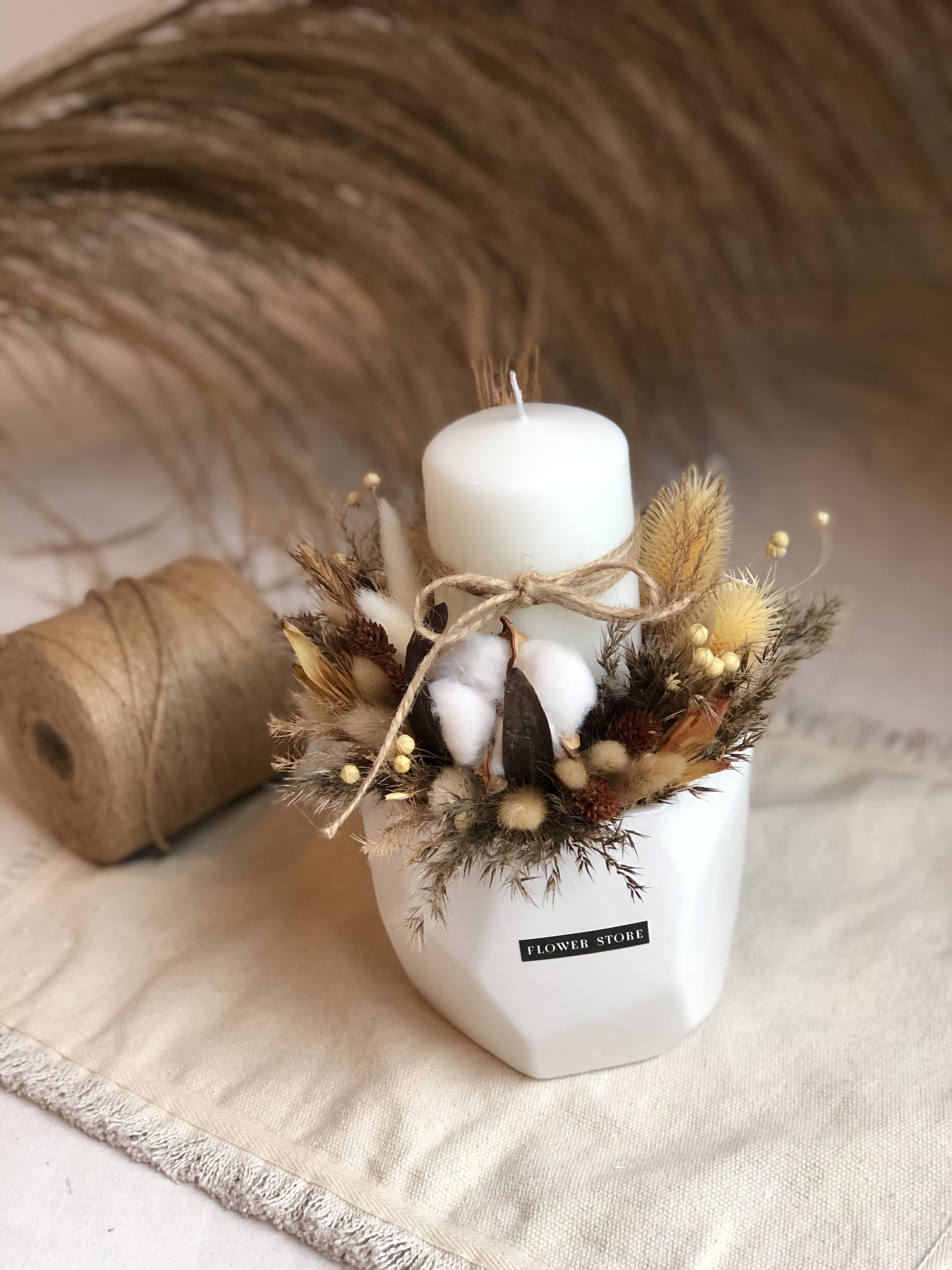 Autumn twilight with a white candle