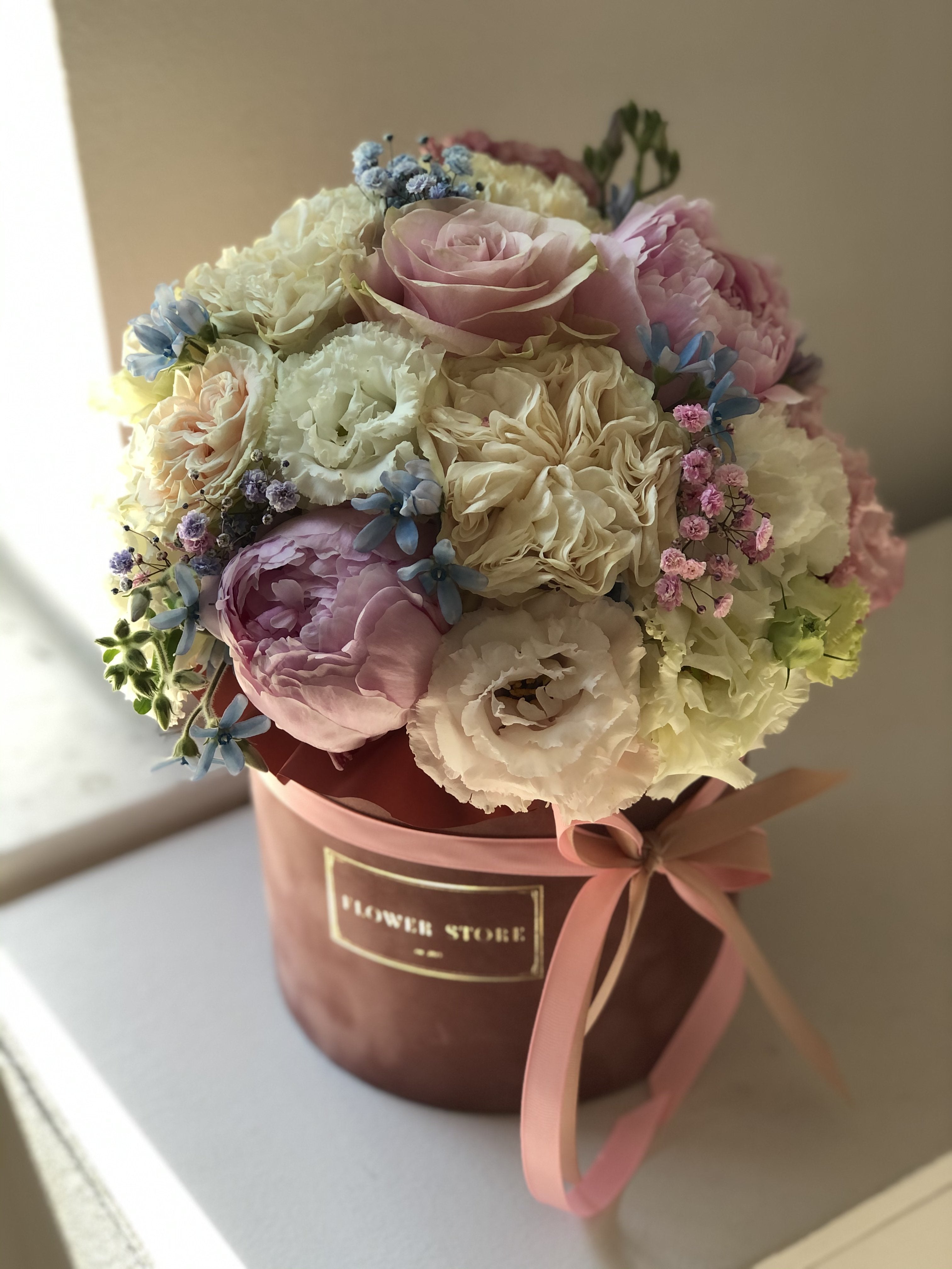 Light pink flocked flowerbox spring composition