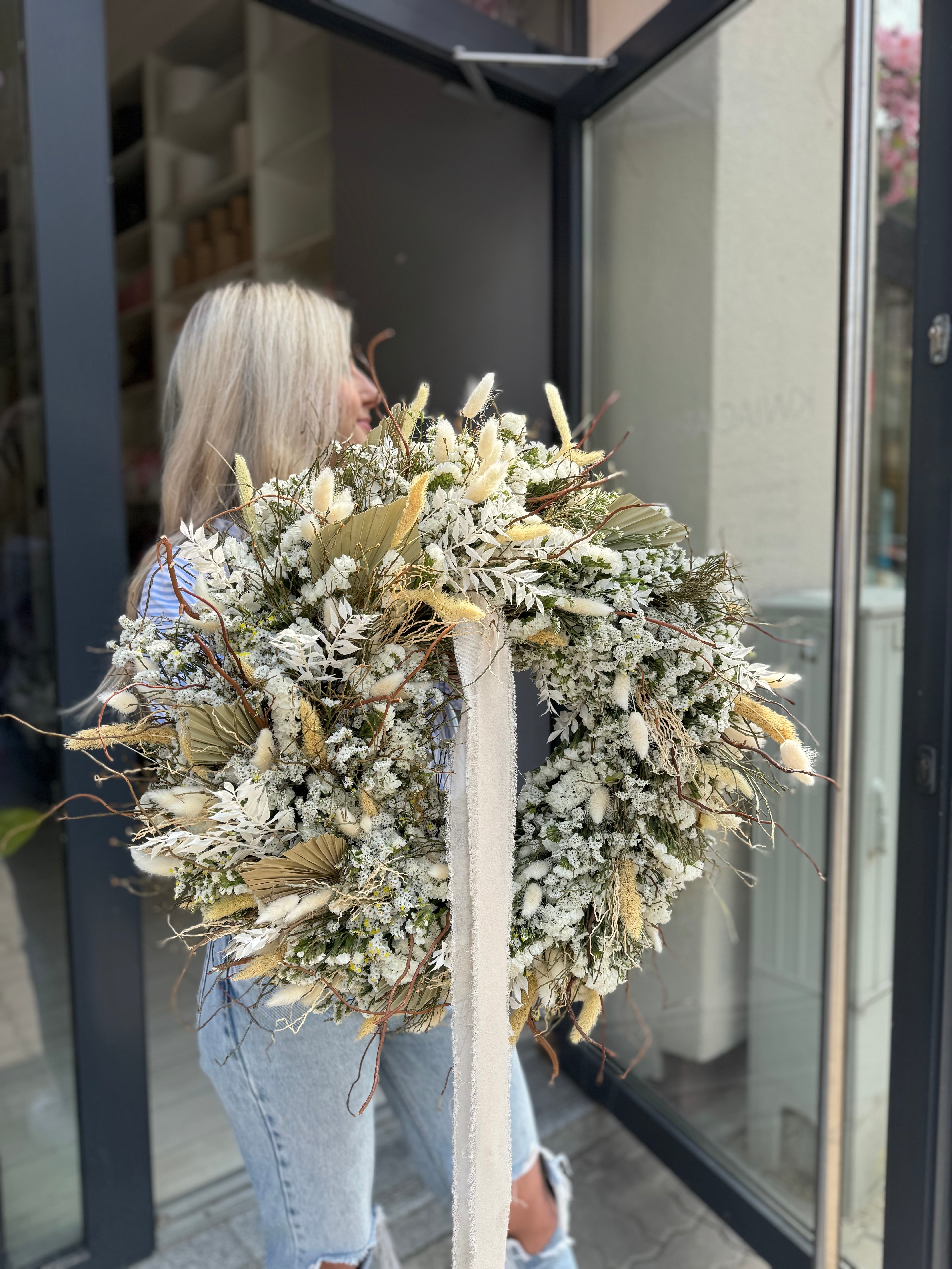 Limonium door wreath with natural ribbons