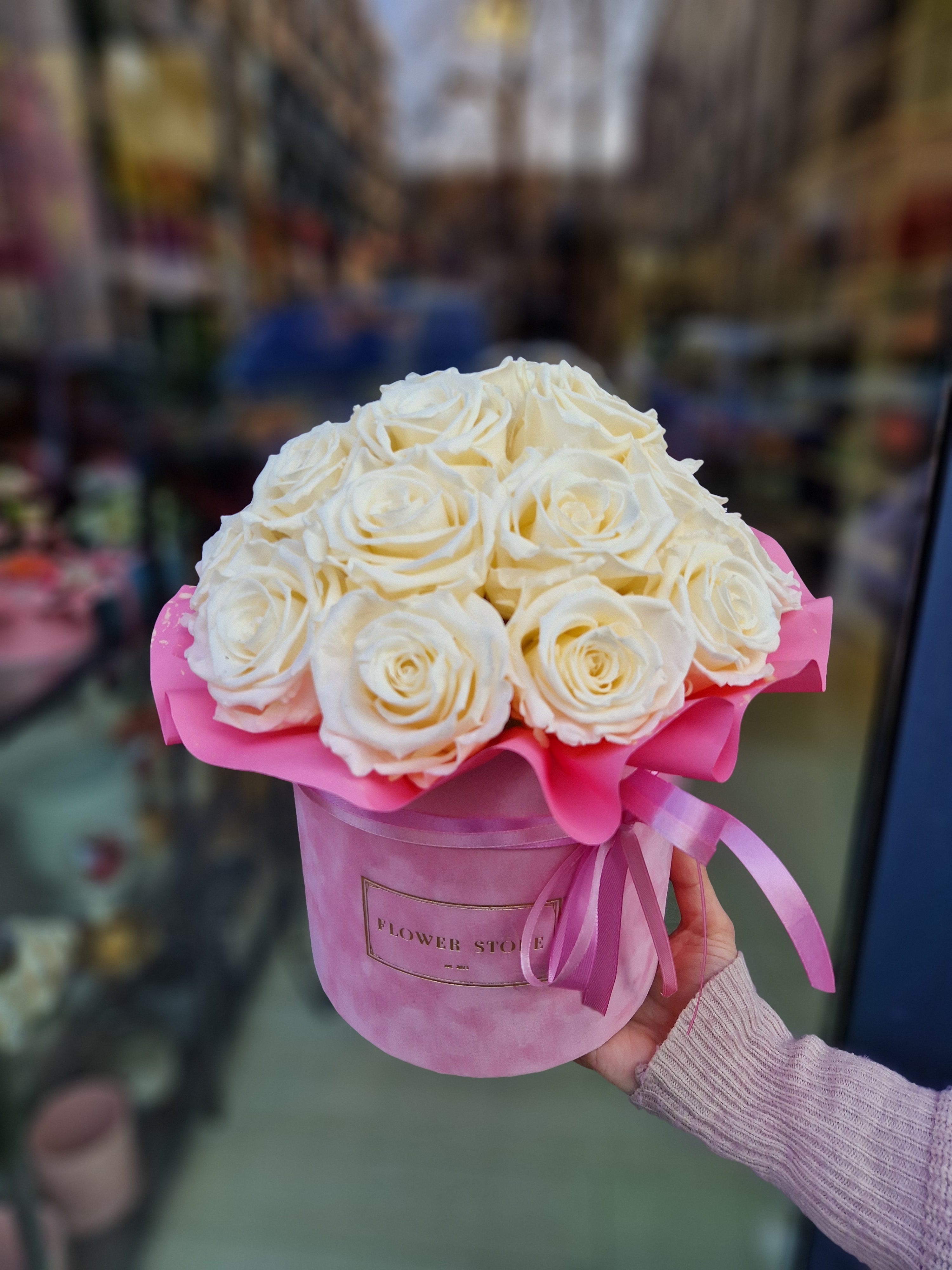 Eternal white roses in a pink flocked flowerbox