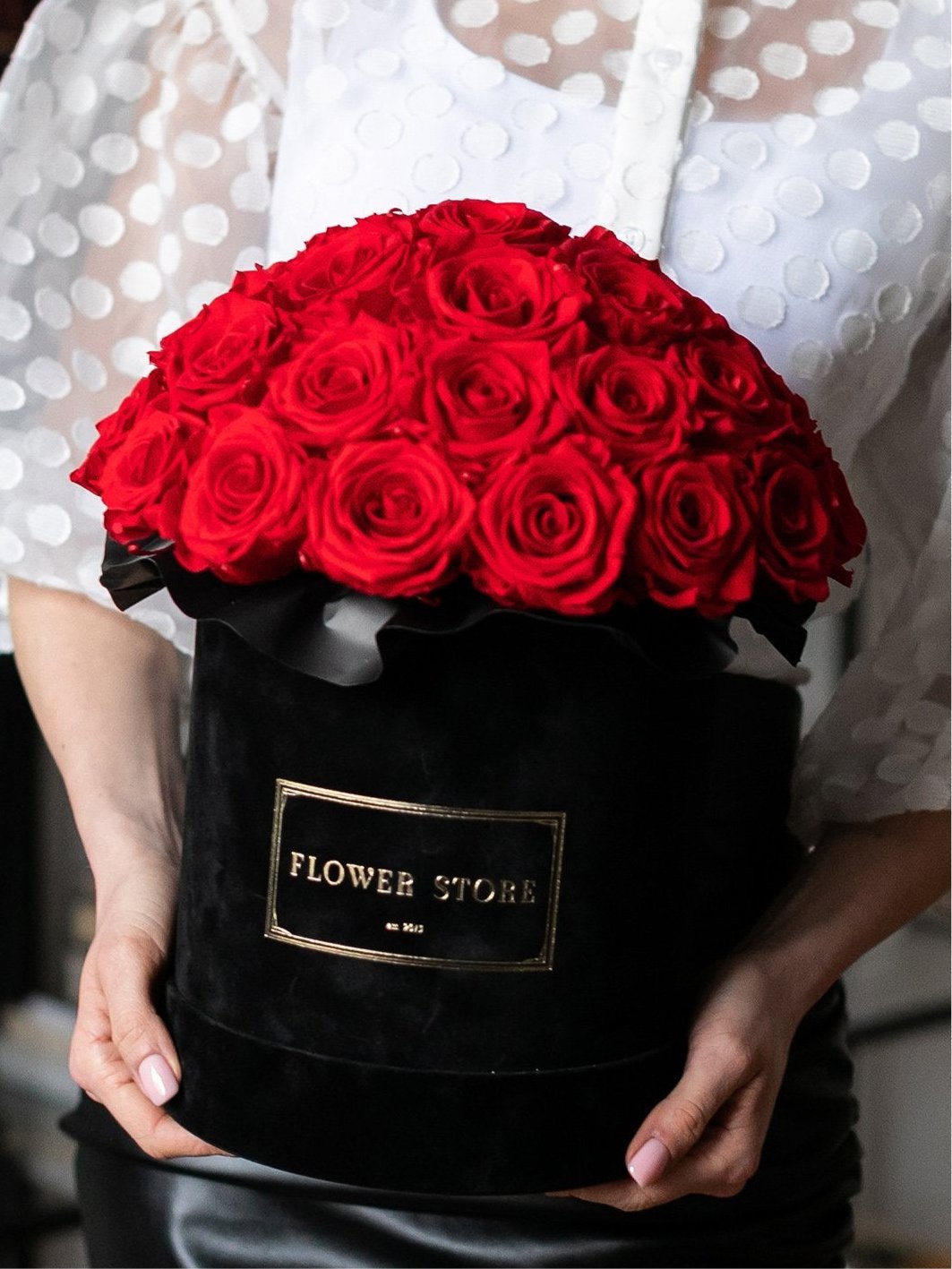 Large black flocked flowerbox with red eternal roses