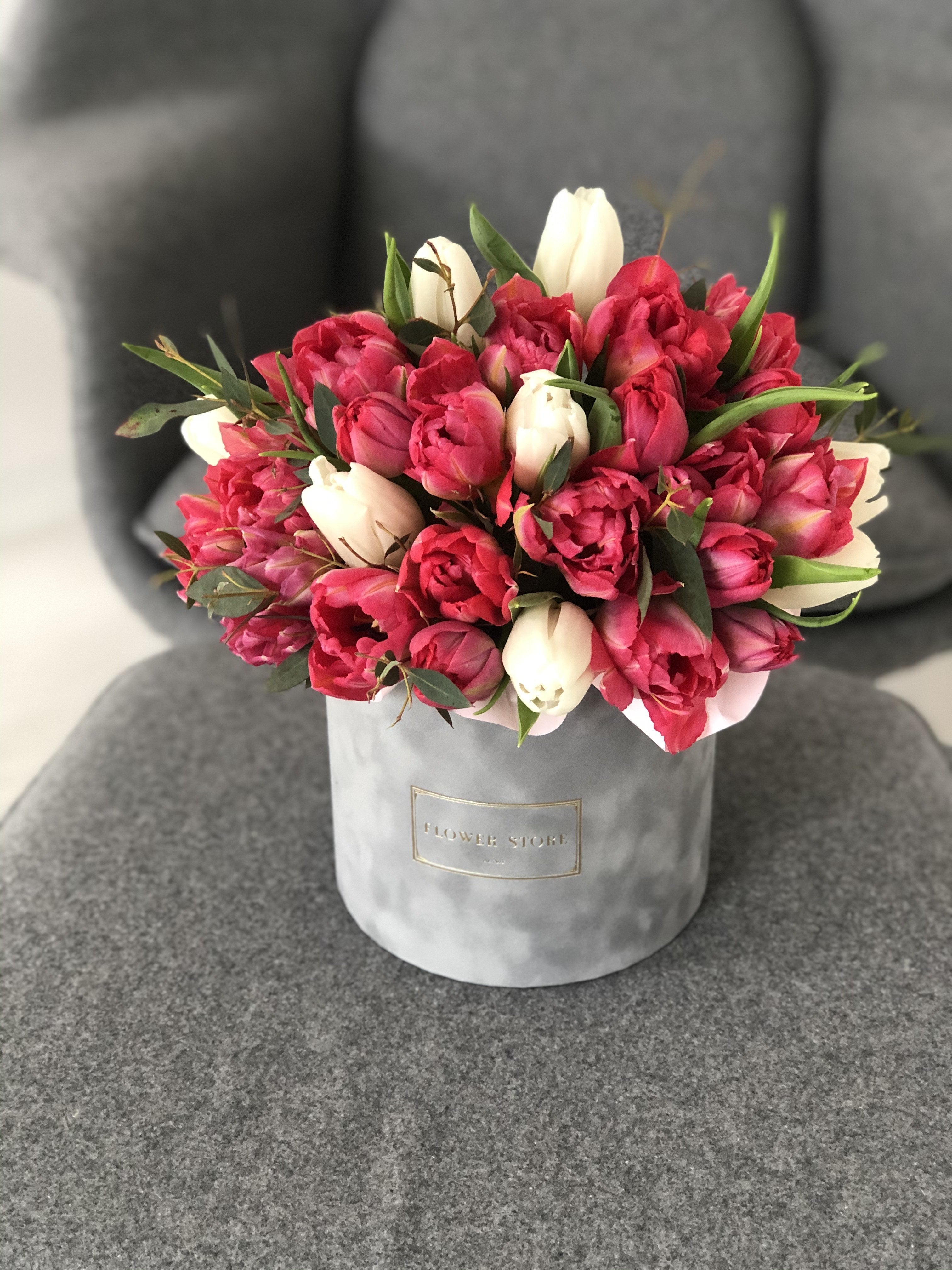 Gray flocked flowerbox with tulips