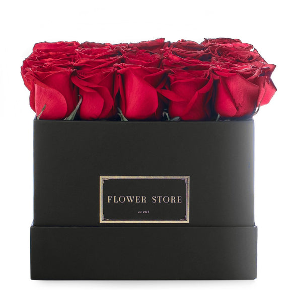 Kwadratowy czarny flowerbox z czerwonymi różami - kwiaty żywe