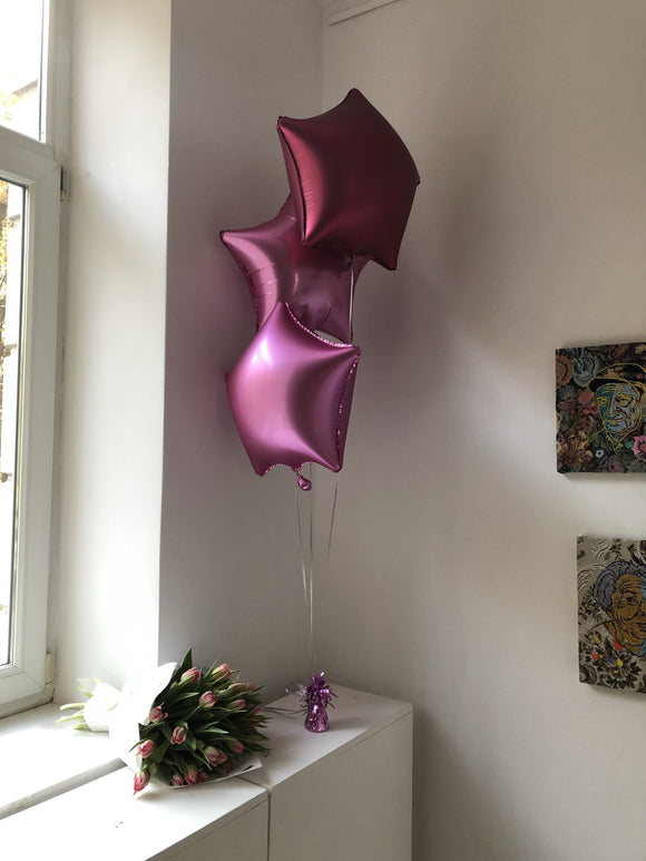 3 helium balloons