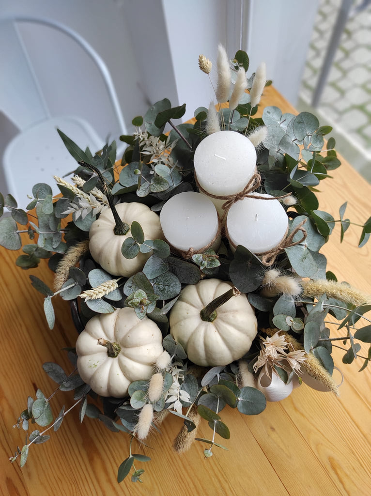 Green Garden composition with pumpkins and candles