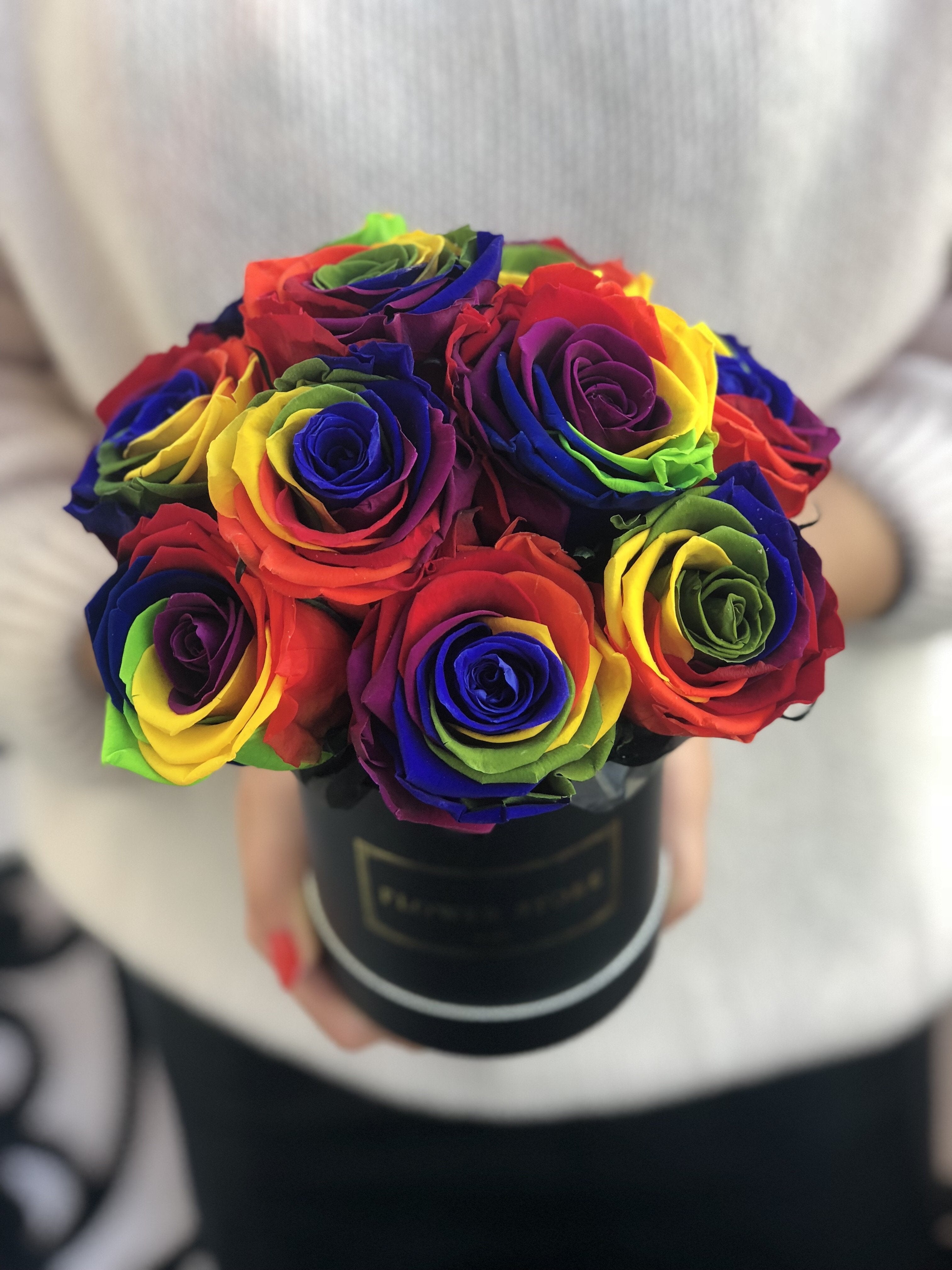 Rainbow eternal roses in a black box