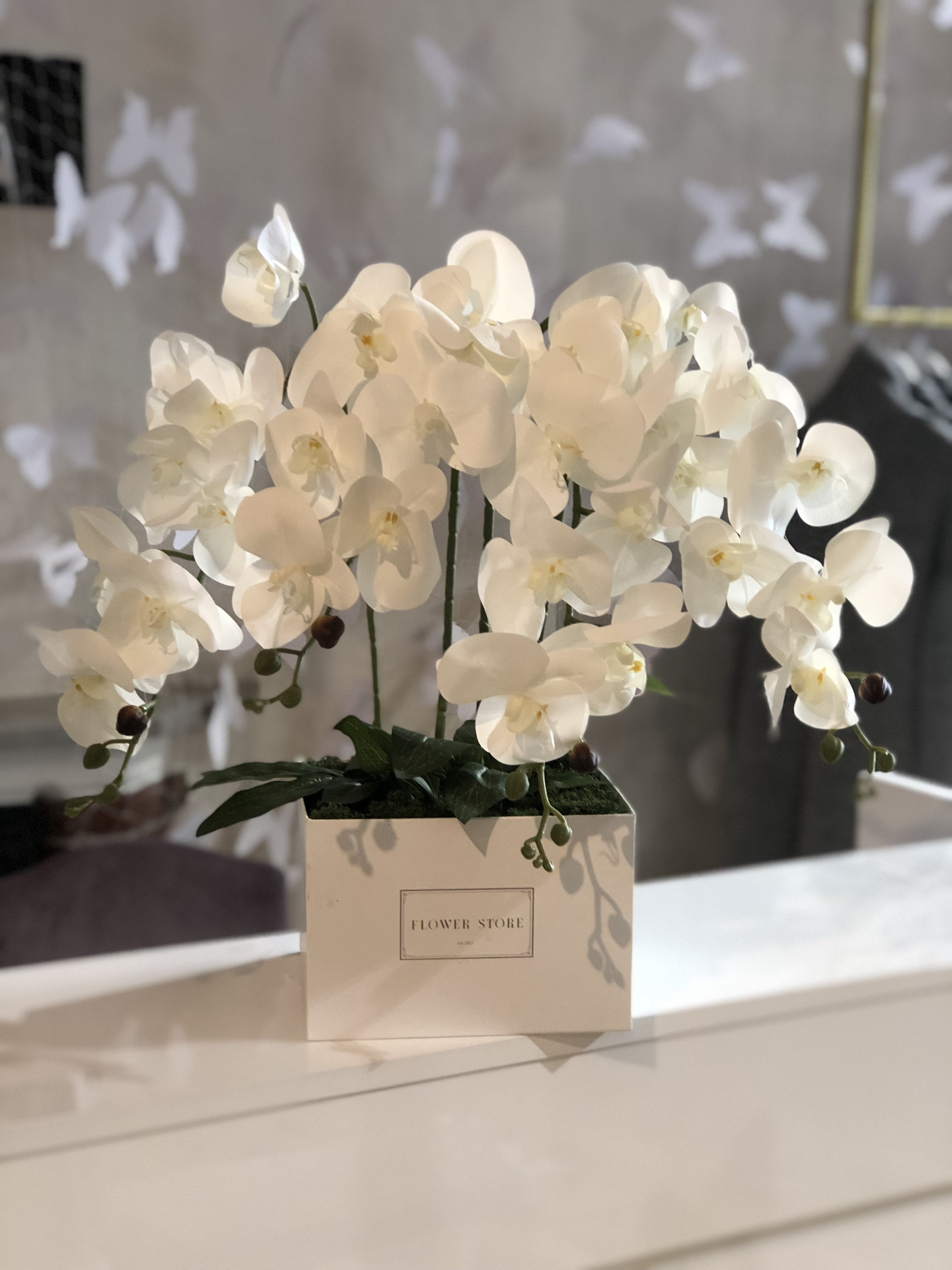 Exclusive orchid in a white box - artificial flowers