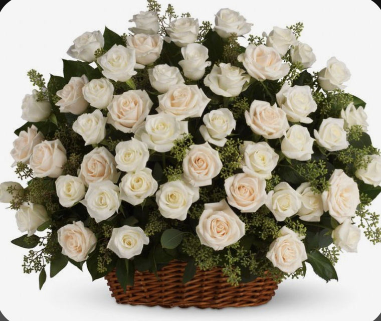 A basket of white roses
