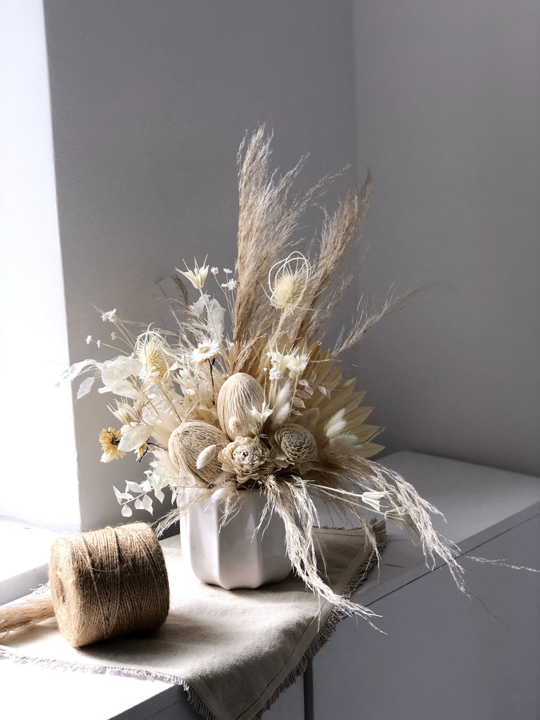 Dried composition in a white ceramic pot